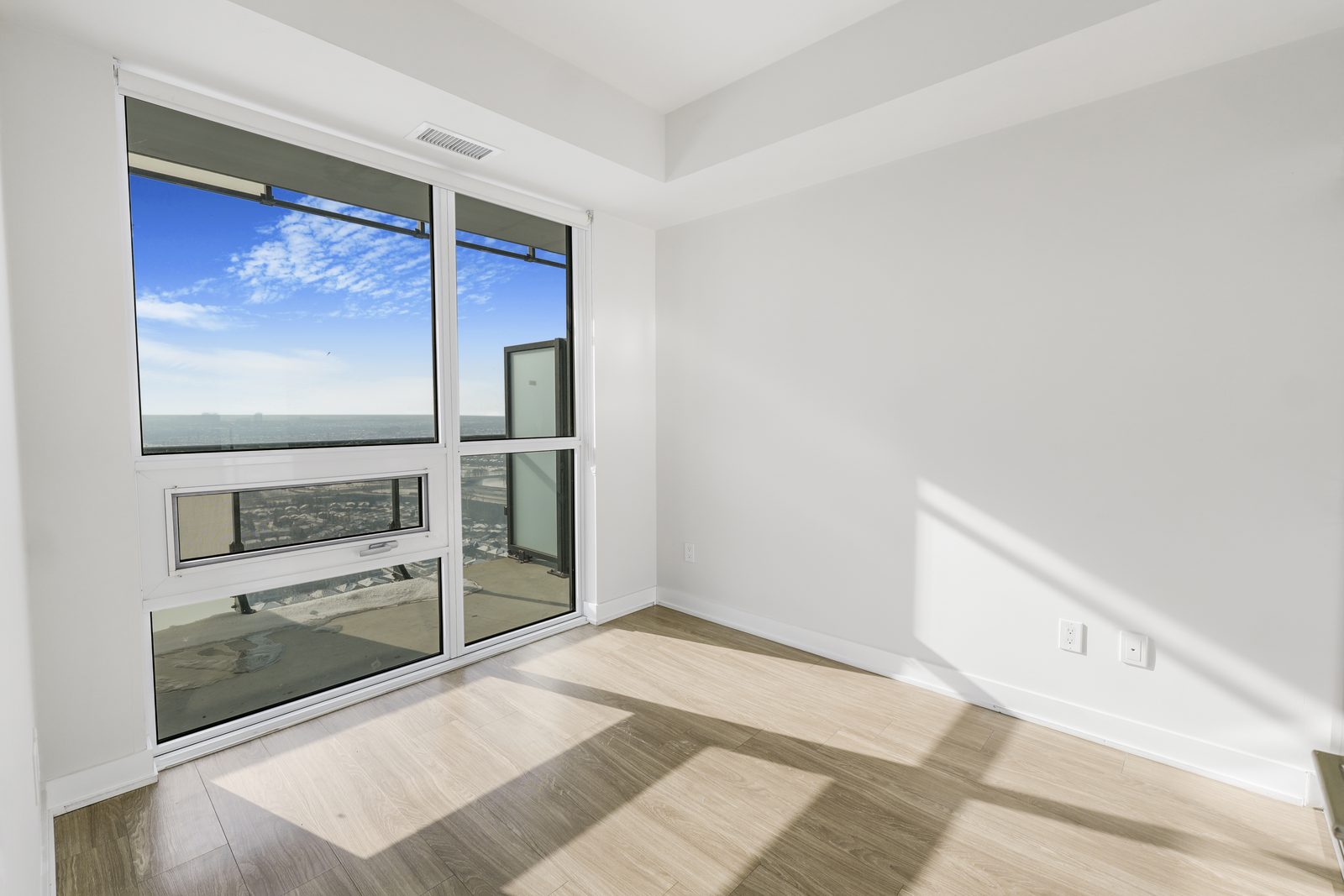 Empty bedroom before staging